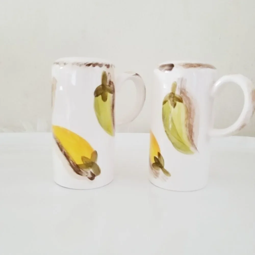 Vintage salt and pepper shakers with hot peppers